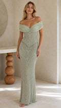 Front view of model wearing sage green off-the-shoulder beaded evening gown
