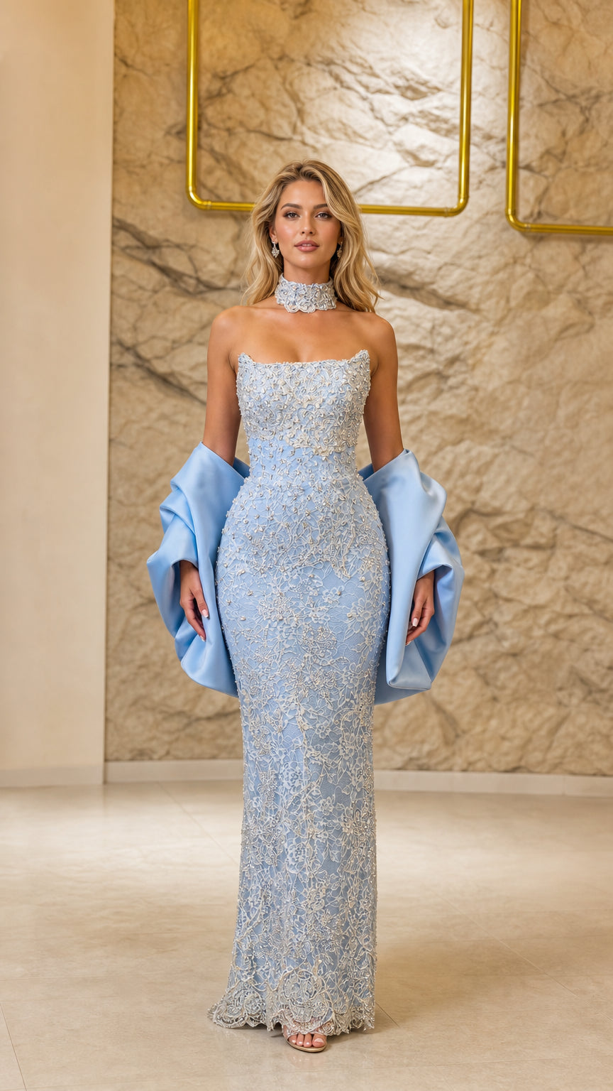 Front view of light blue embellished strapless evening gown with matching choker and stole