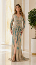 Front view of champagne beaded long sleeve evening gown with high slit