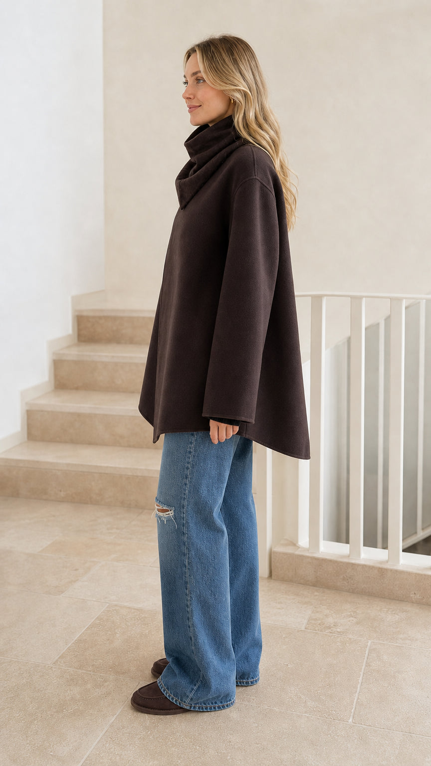Side profile view of dark brown wool blend jacket