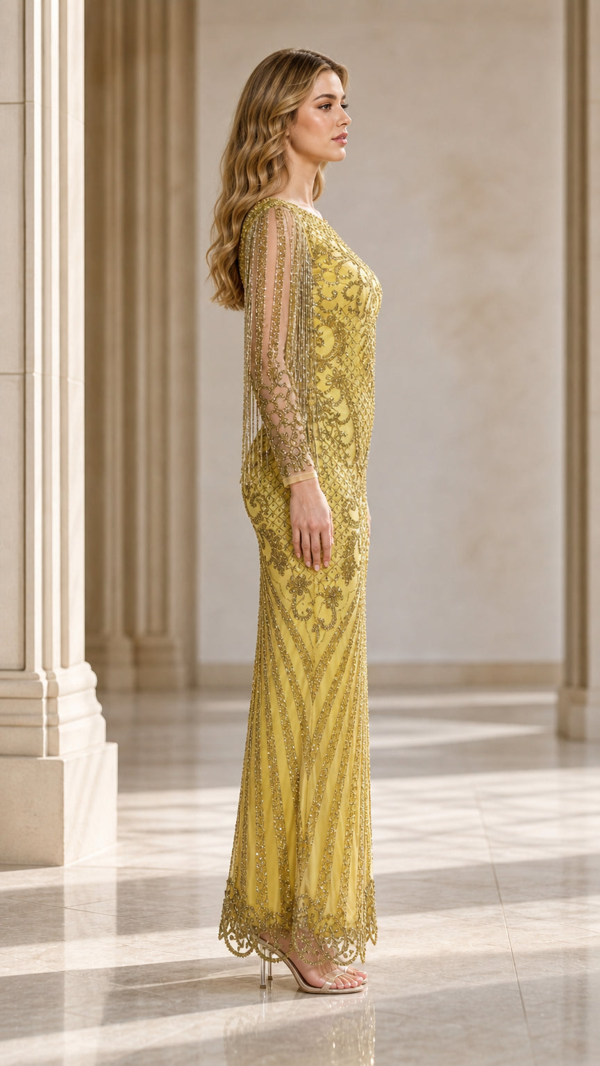 Side profile view of yellow beaded evening gown