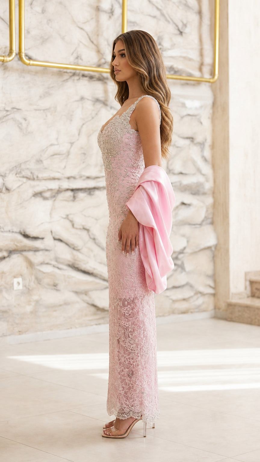 Side profile view of pink evening gown