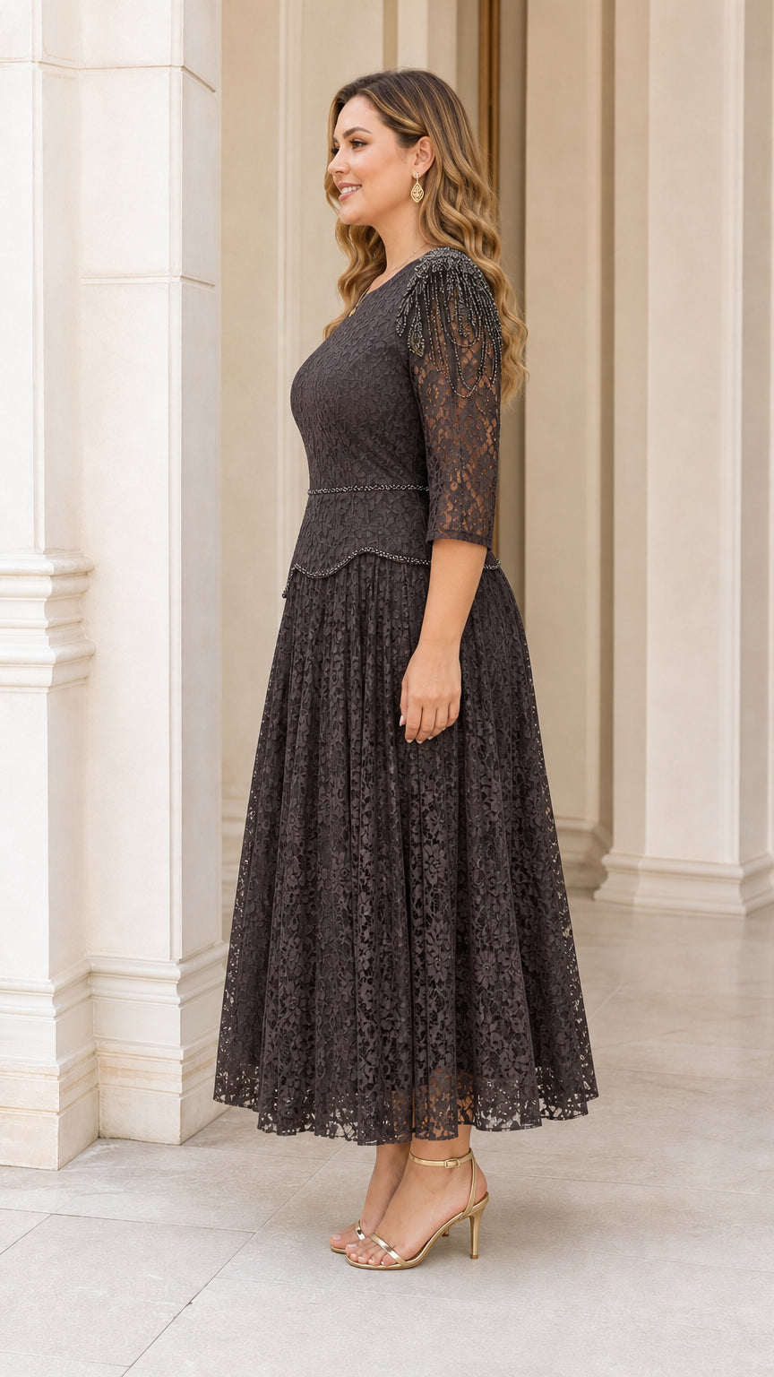 Side profile view of plus size dark charcoal lace dress