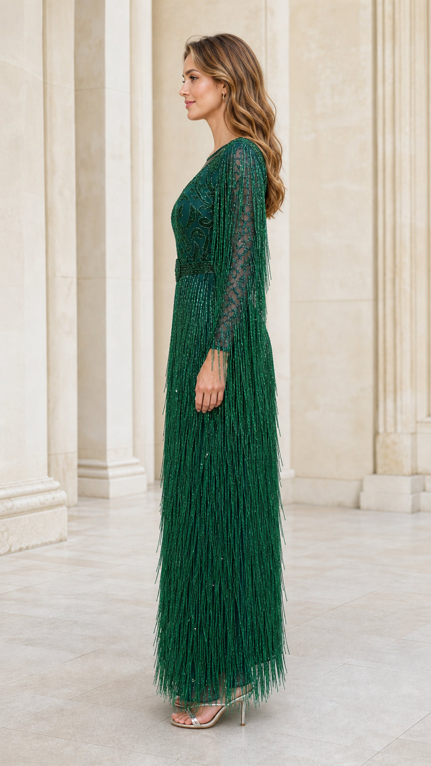 Side profile view of emerald green evening gown