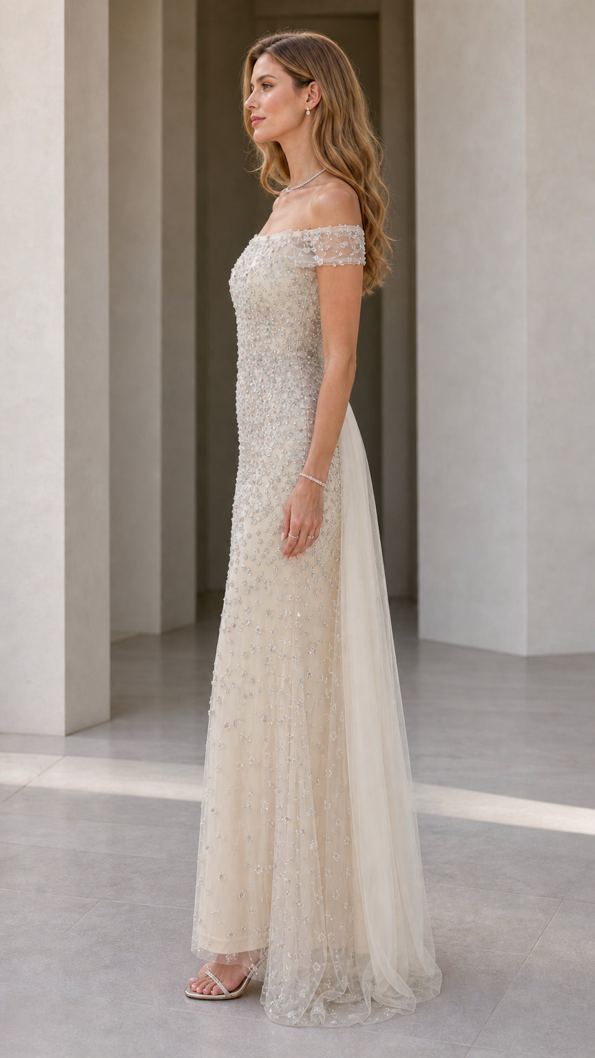 Side profile view of champagne beaded formal gown