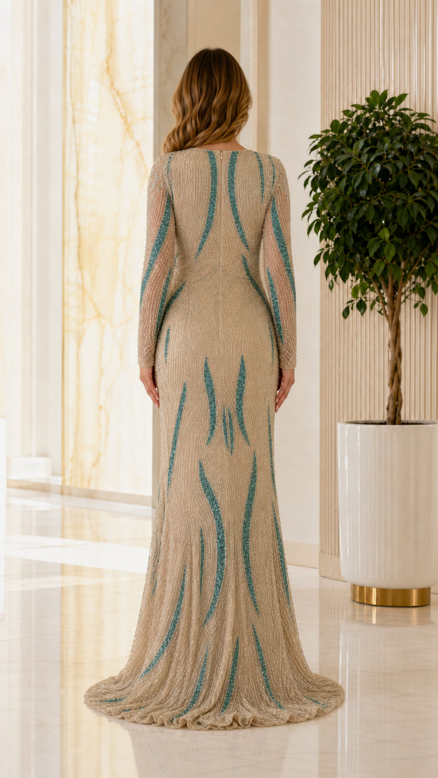 Back view of champagne evening gown with sweep train