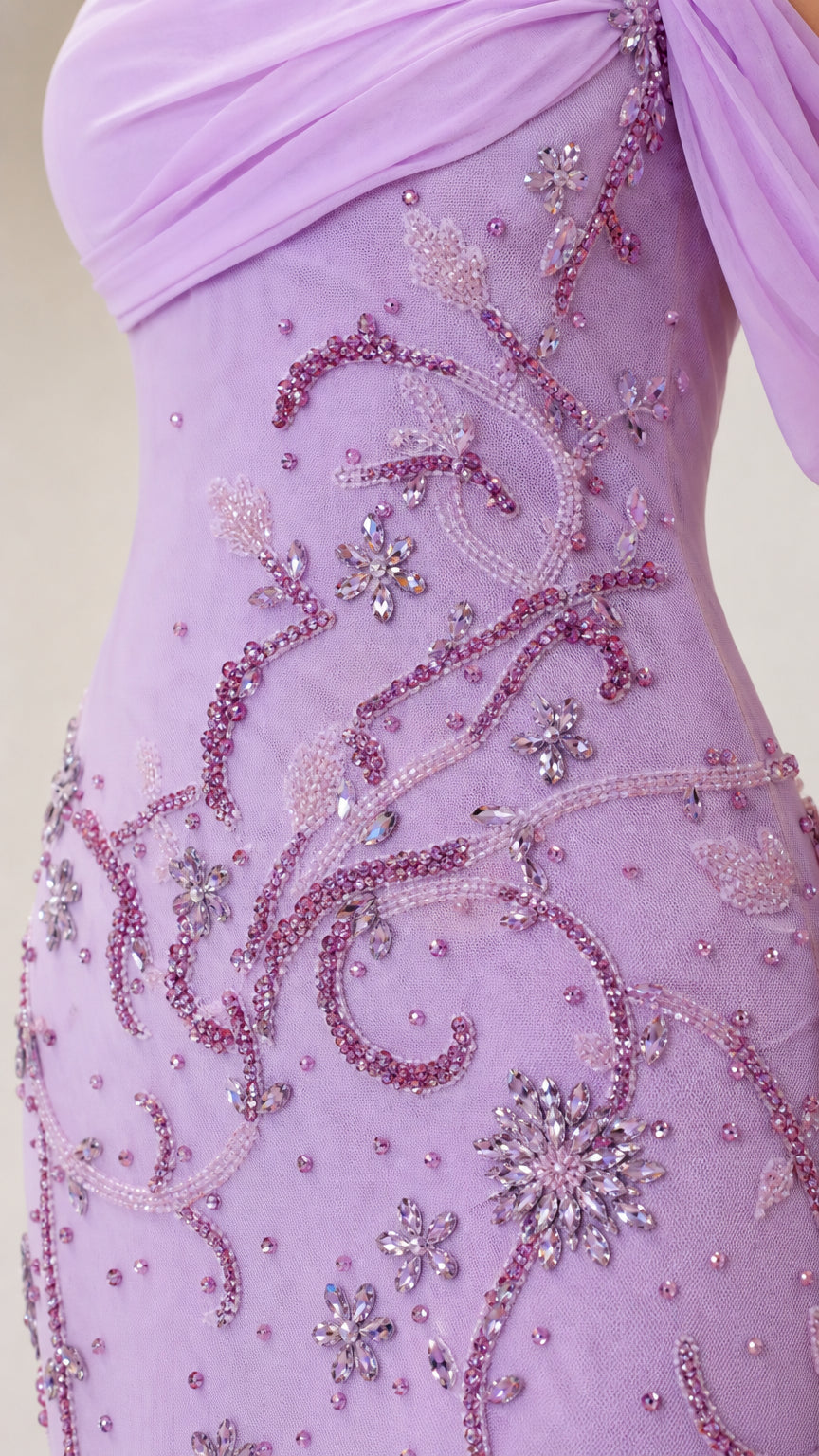 Close-up detail of intricate bead and crystal embroidery on bodice