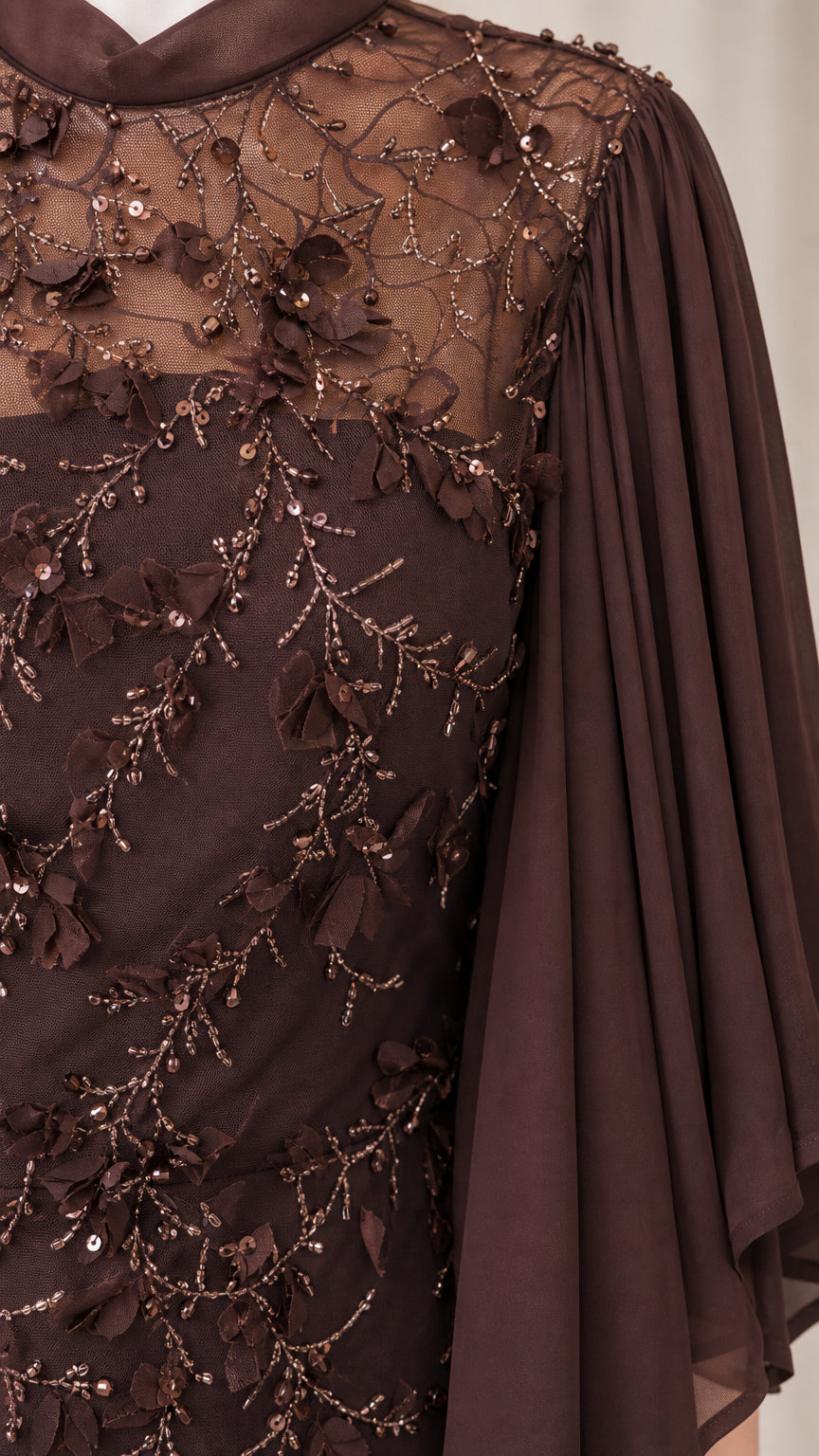 Close-up of embroidered sheer bodice and neckline