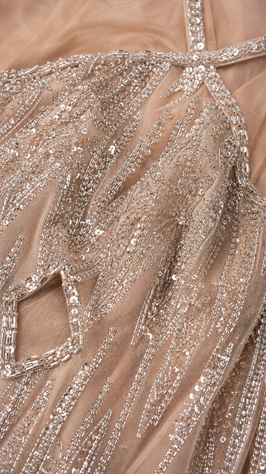 Close-up detail of sequin and bead embroidery texture