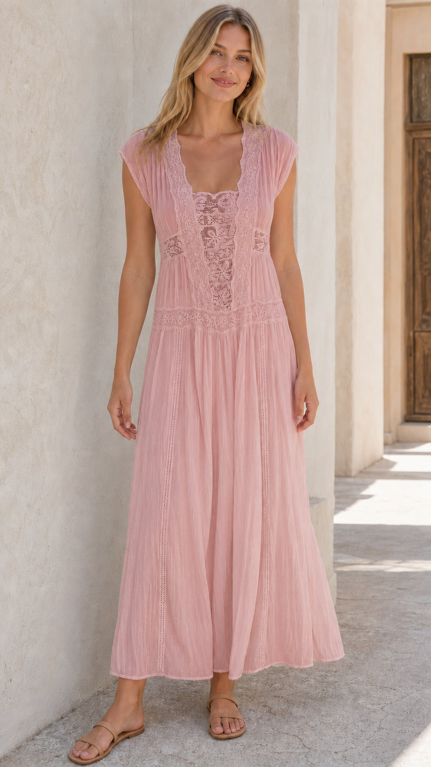 Woman wearing pink sleeveless lace panel maxi dress