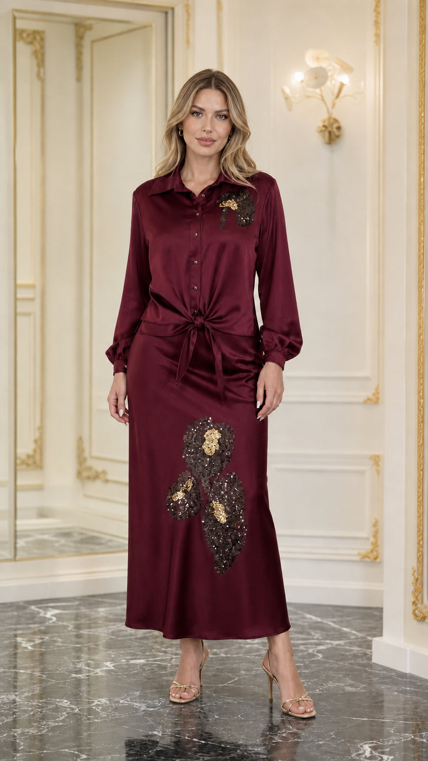 Model wearing burgundy satin sequined two-piece set