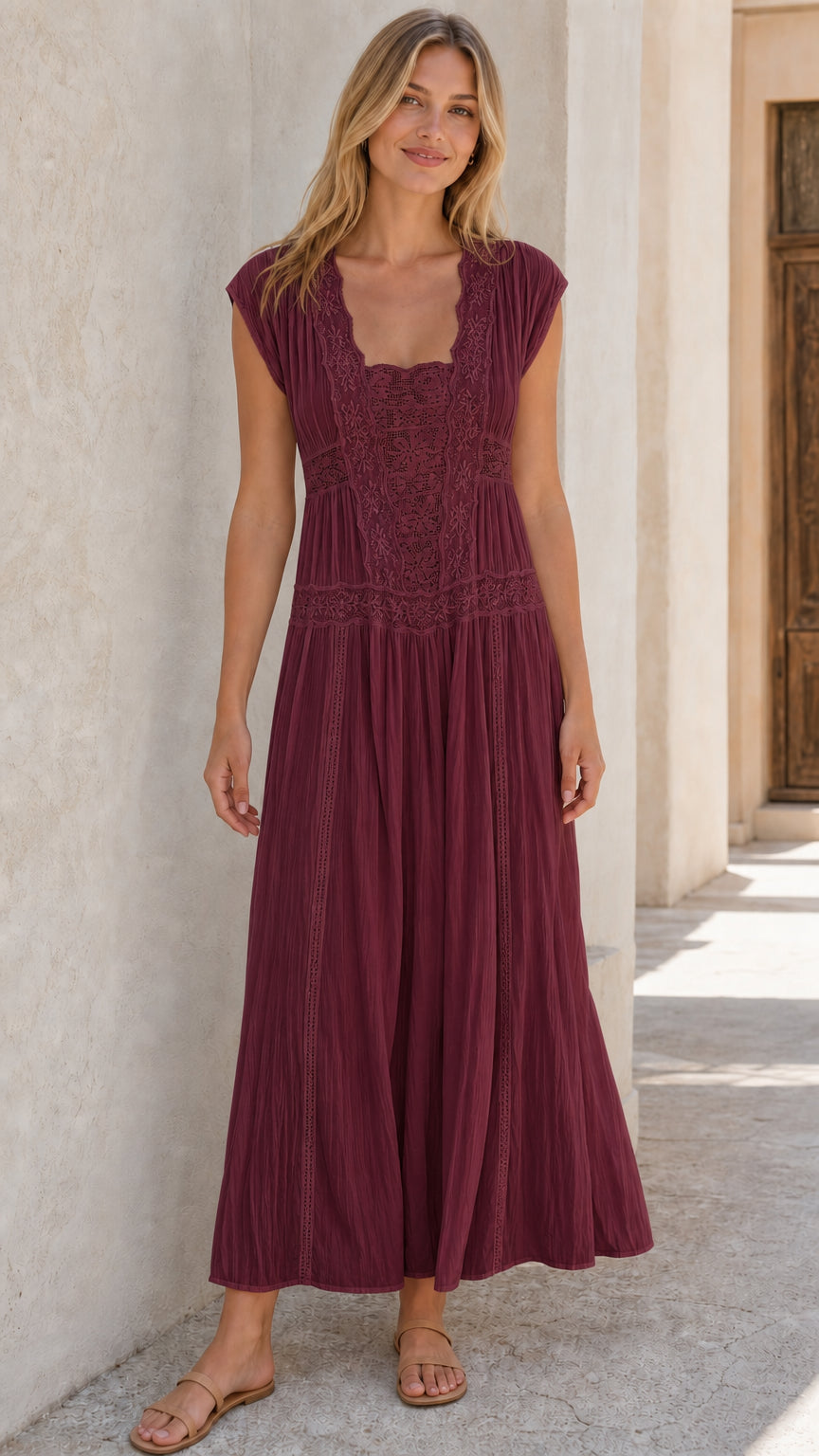 Woman wearing burgundy sleeveless lace panel maxi dress