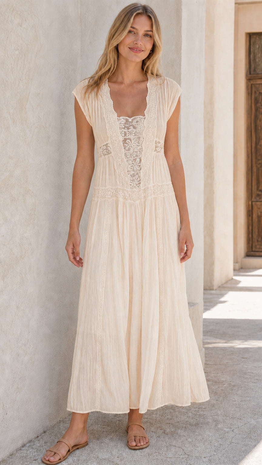 Woman wearing beige sleeveless lace panel maxi dress