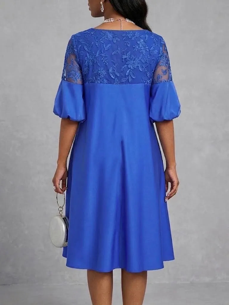 Elegant Yet Casual Solid-color Dress Featuring Embroidery, Paneling, A Round Neck, And Lantern Sleeves.